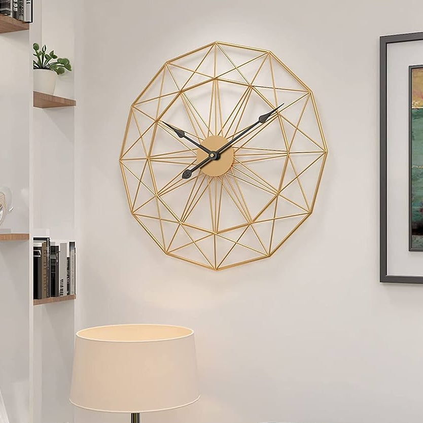 Golden metal wall clock with modern luxury design for home and office wall décor.
