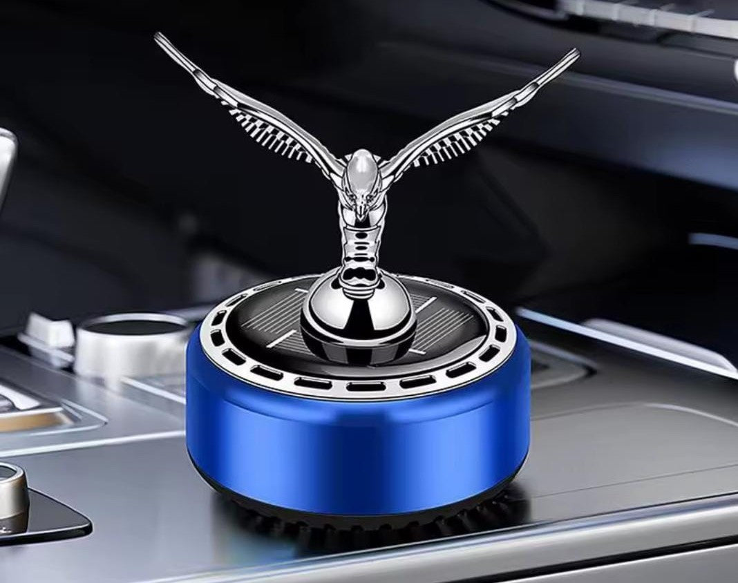 Automatic rotating solar car dashboard air freshener with essential oil, available in gold, blue, and red.