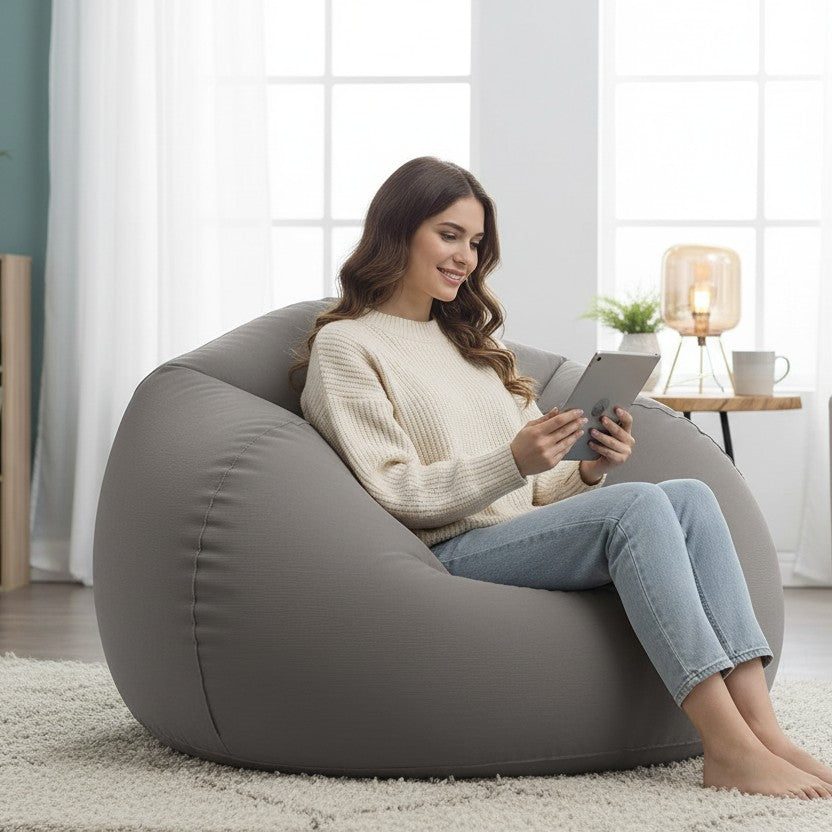 Inflatable lounge chair with soft flocked top and deep bucket seat