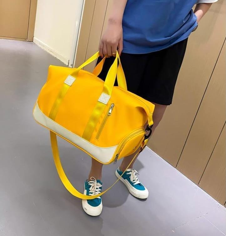 Waterproof gym duffle travel bag with shoe compartment, size 47 by 25 by 27 cm, spacious and durable.