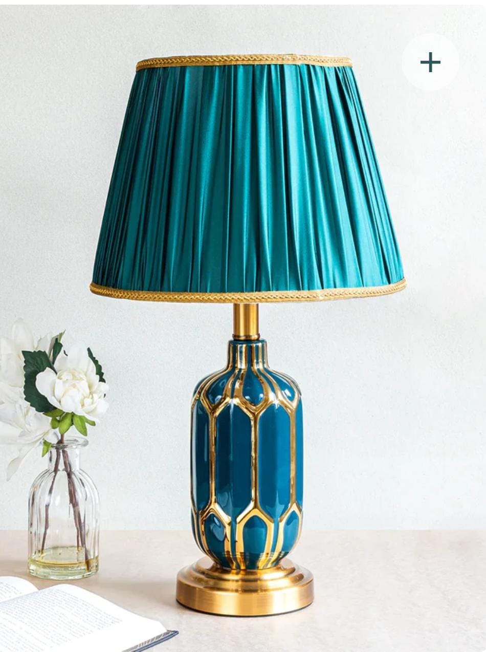Ceramic table lamp with elegant base for bedroom, living room, or office lighting