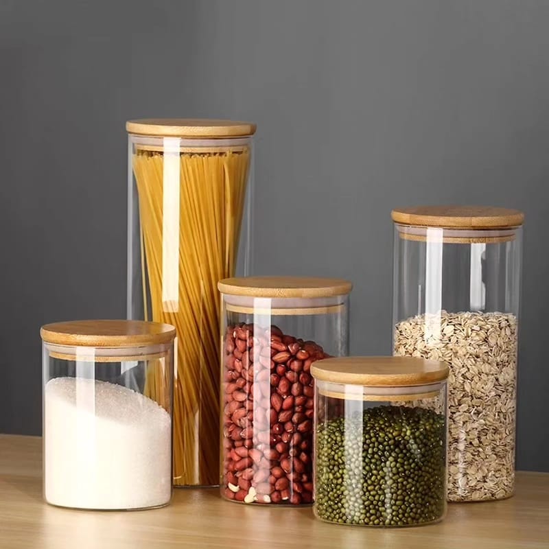 Set of 5 round borosilicate glass jars with bamboo lids, sizes 1.5L to 0.52L, for storing dry foods and liquids