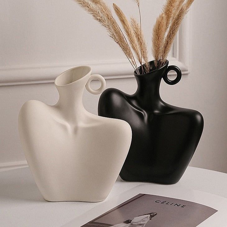 Black ceramic vase shaped like a human collarbone, 21 Γ 18.5 cm