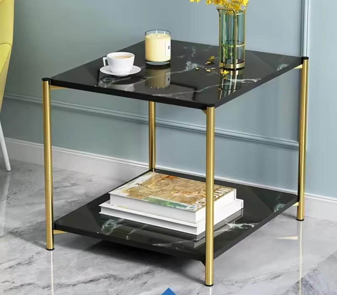 Black two-tier luxurious side table for storage and dΓ©cor.
