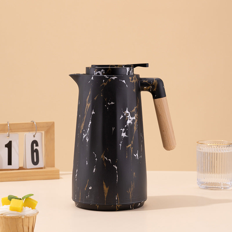 Marble vacuum flask 1000 ml, insulated thermos with push-button pour for hot and cold beverages.