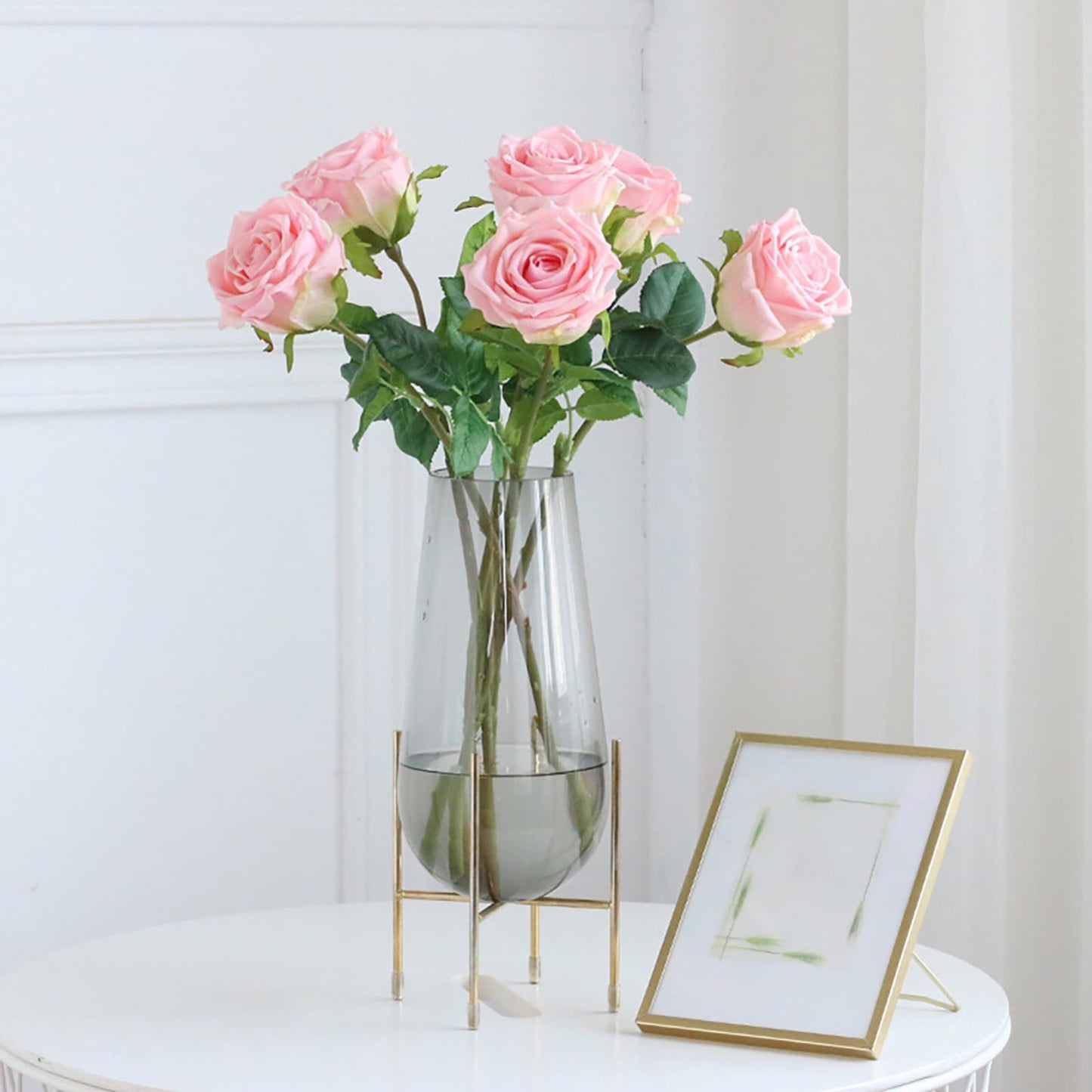 Clear glass flower vase, elegant decorative vase for fresh or artificial flowers in home or office.