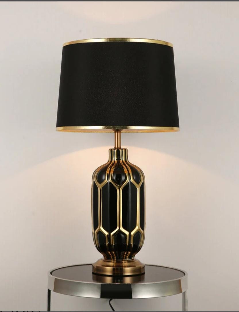Ceramic table lamp with elegant base for bedroom, living room, or office lighting