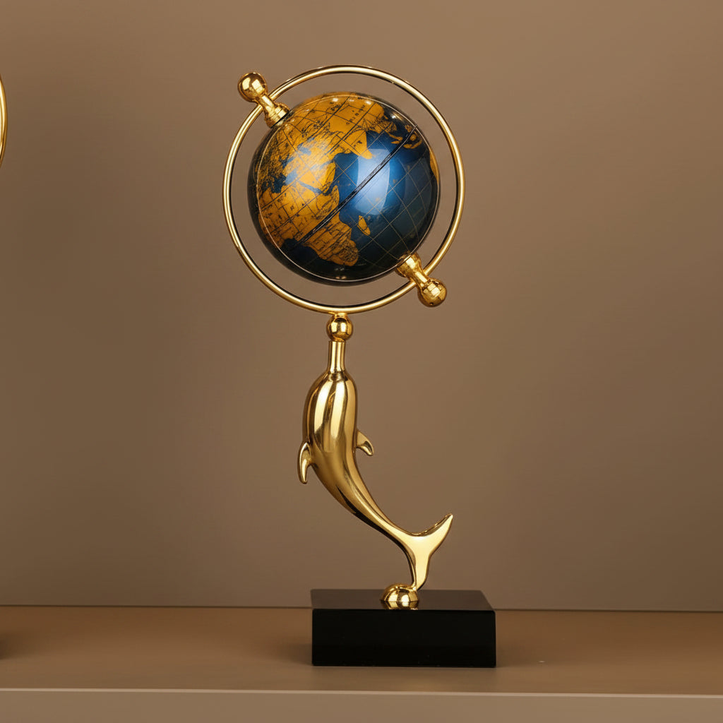 Golden dolphin globe decor ornament, luxury ocean themed table decoration for home and office.