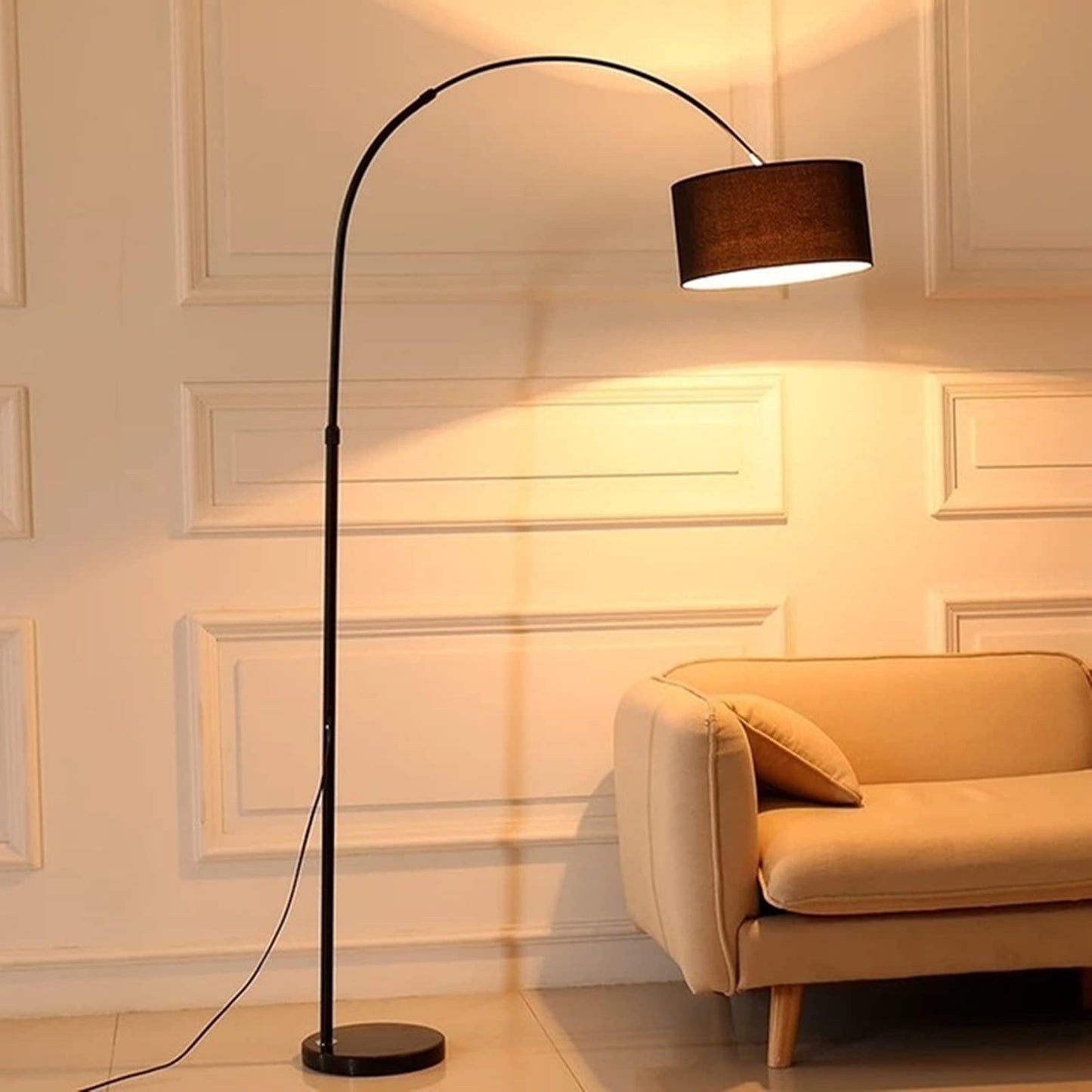 Modern arched floor lamp with curved frame and sturdy base for home lighting