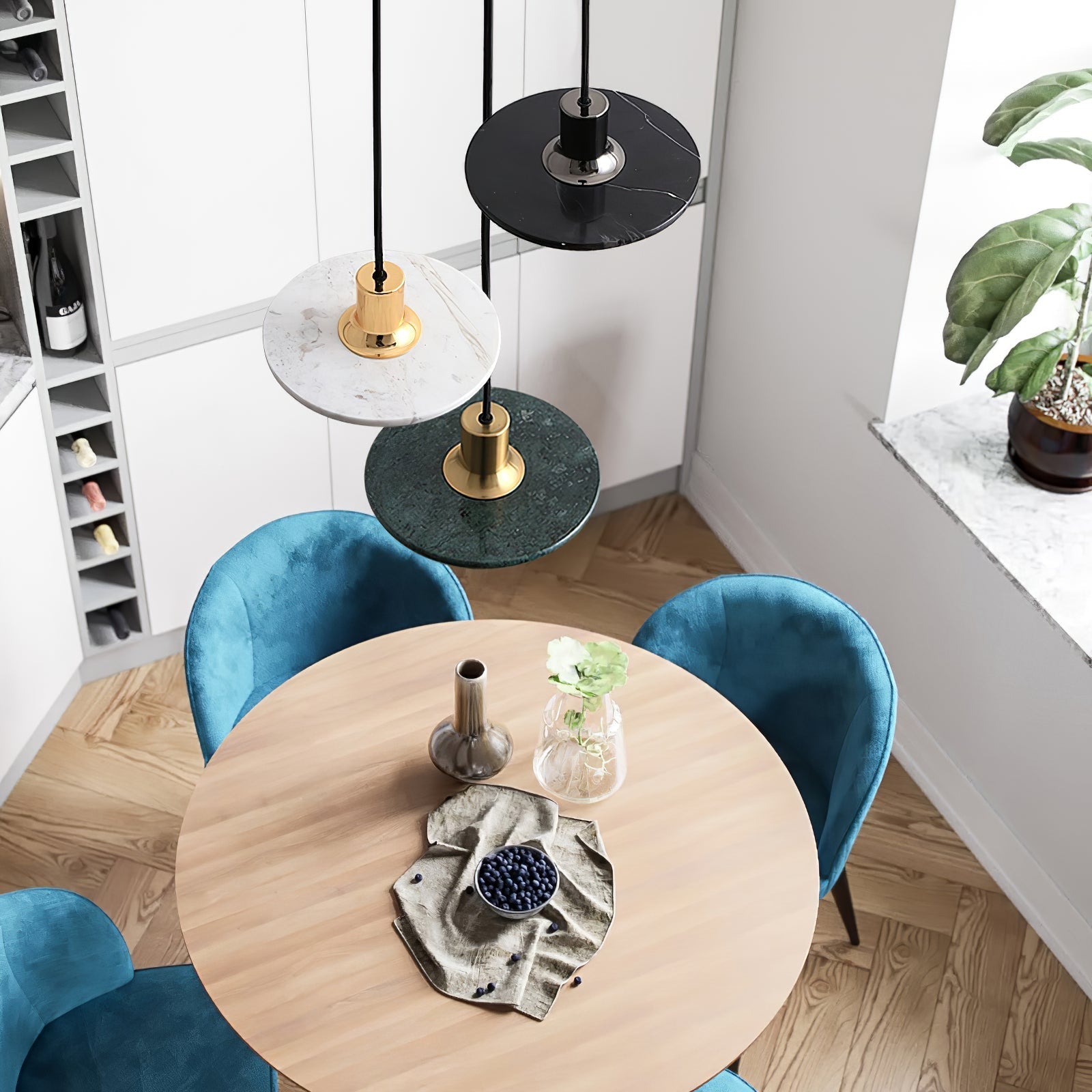 Dawood Lifestyle & Gadgets kes marble disc pendant light with natural marble shade and metal accents, available in white marble gold, green marble gold, and black marble chrome finishes for luxury modern interiors.
