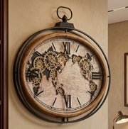 Oval wooden wall clock with metallic side frame, exposed decorative moving gears, and an analog clock face for indoor wall décor.