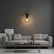 Geometric black wall light with wooden wall mount, metal cage design, and E27 bulb holder for living rooms, bedrooms, dining areas, cafés, and modern interior lighting PL 1140-01-BK - Gemelli Collection