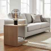 modern table lamp with smoky glass shade and matt black base for ambient lighting