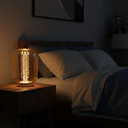 LED table lamp with brass frame amber glass and acrylic tube warm white lighting