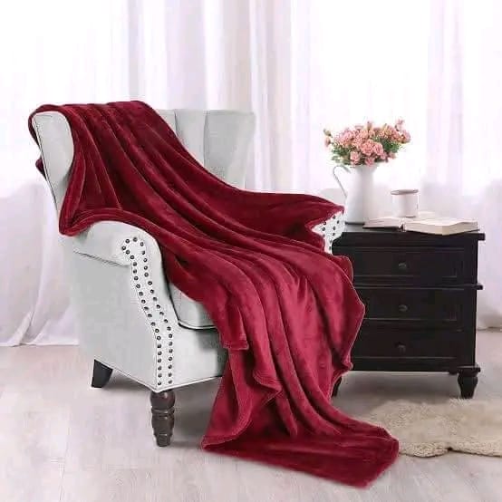 Cozy throw blanket for bedroom, sofa and travel in maroon,