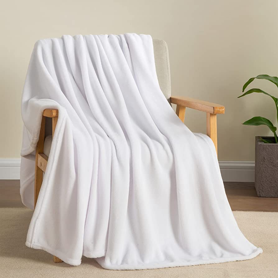 Cozy throw blanket for bedroom, sofa and travel in white