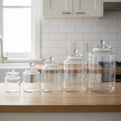 Clear glass storage jars with airtight lids available in multiple sizes for kitchen organization and dry food storage