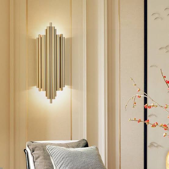 Gold Art Deco wall lamp with E14 bulb holder and decorative structured design for living rooms, bedrooms, hallways, hotels, and feature walls LP 8186-GO - Gemelli Collection