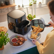 3000 Series 4.1L air fryer with 1400W power, Rapid Air technology, digital touch screen, and 7 presets for frying, baking, grilling, roasting, and reheating HD9252/91.