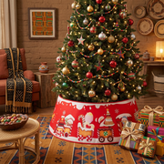 Red tree collar under a Christmas tree in an African home