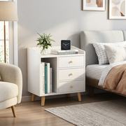 Wooden bedside table with three drawers and vertical grid storage measuring 43 × 30 × 62 cm for bedroom and hotel use.