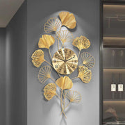 Iron wall clock with gold finish designed as a modern decorative and functional timepiece for home or office walls. 