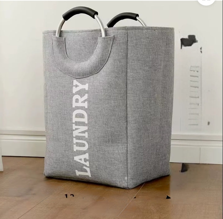 Large laundry basket in beige and grey for storing clothes
