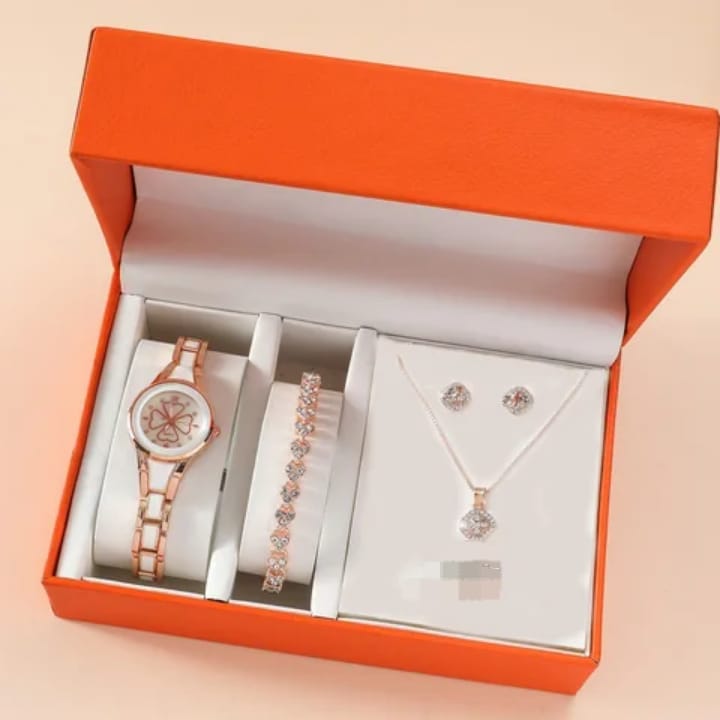 4-in-1 ladyies gift set with gold watch, necklace, bracelet, and earrings.