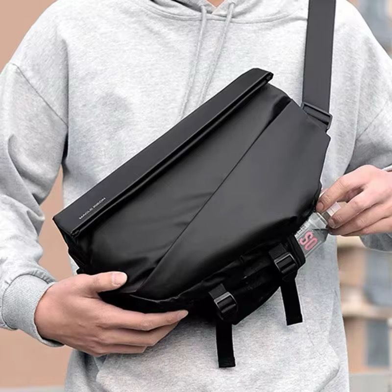 Waterproof unisex travel crossbody bag with multiple pockets and retractable key chain in grey and black