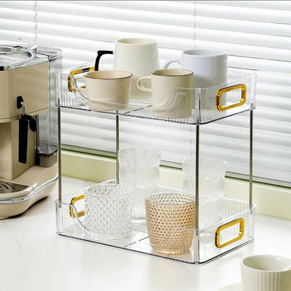 2 Layer gold organizer with clear and green trays for cosmetics and jewelry storage
