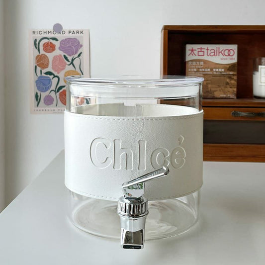 2.3L CHLE glass juice dispenser with acrylic lid, filter, and faucet.