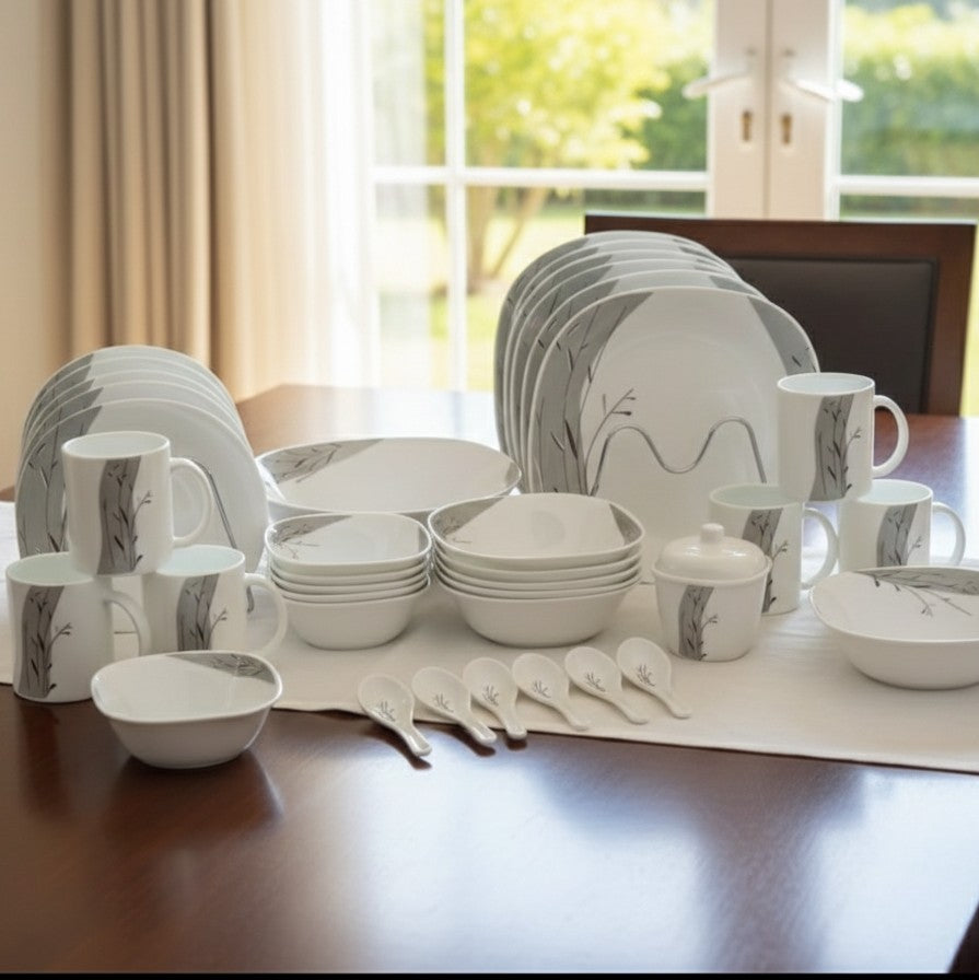 39-piece White ceramic dinner set including plates, bowls, cups, and platters.