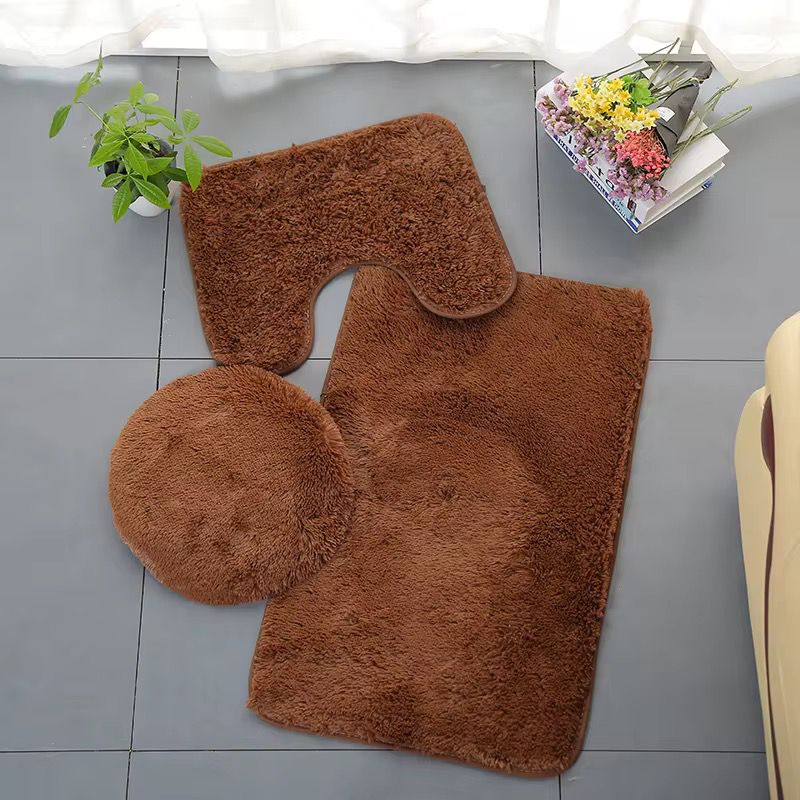 Three piece fluffy non slip bathroom toilet mat set in assorted colors.