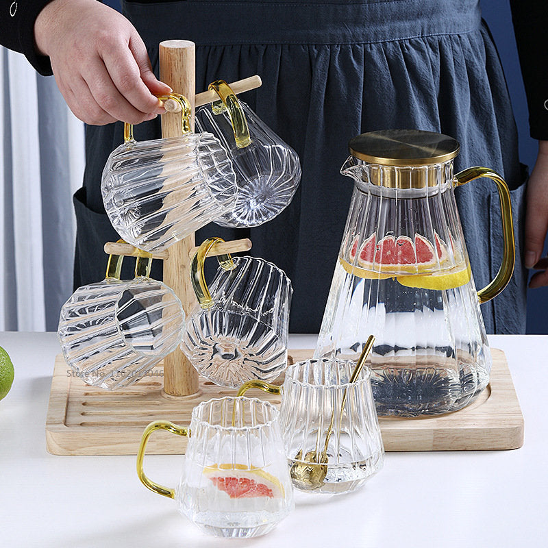 Large-capacity glass decanter kettle set with cups.