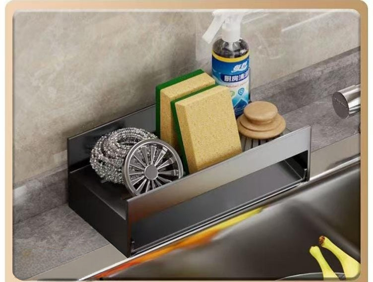 Compact countertop drain rack for holding sponges and detergents.