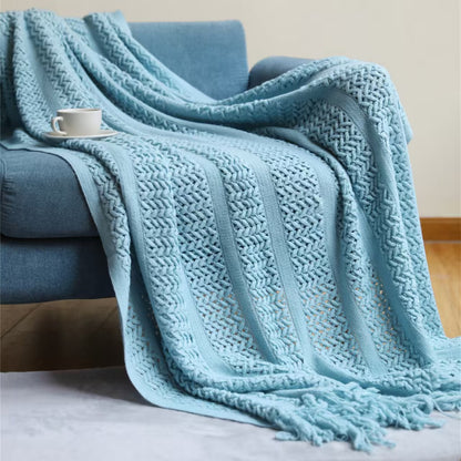 Large throw blanket sized 130 × 230 cm draped over a sofa for warmth and home décor.