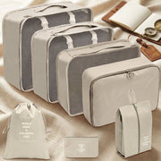 7 piece beige luggage travel organizer set made from Oxford fabric with breathable mesh panels and double zipper closures for organized suitcase packing.