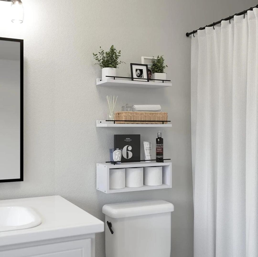 40 cm solid pine wood 3-tier floating wall shelves available in White/Gold, Black/Gold, and White/Black for stylish home storage and décor.