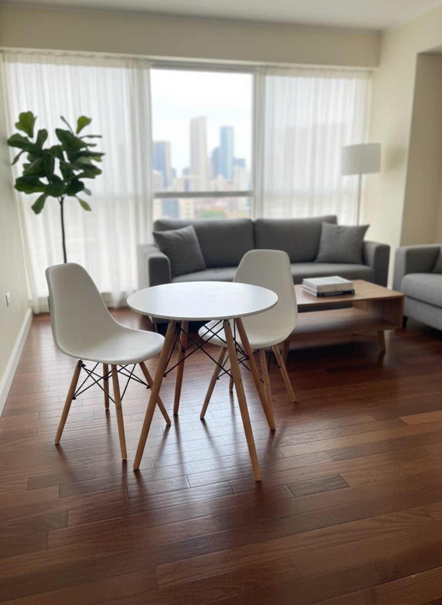 Scandinavian style two-seater dining table with matching chairs in a minimalist design.