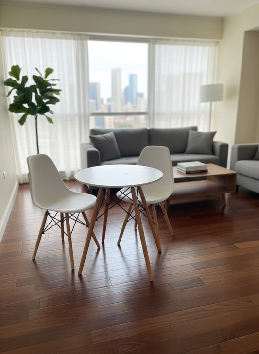 Scandinavian style two-seater dining table with matching chairs in a minimalist design.