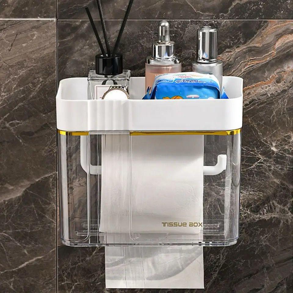 Gold-plated wall-mounted tissue box with storage tray for bathroom or living room.