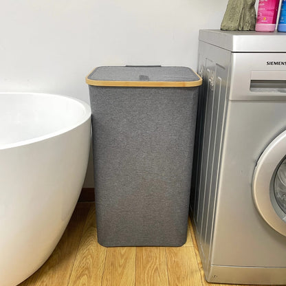 Large black and grey laundry basket with big capacity.