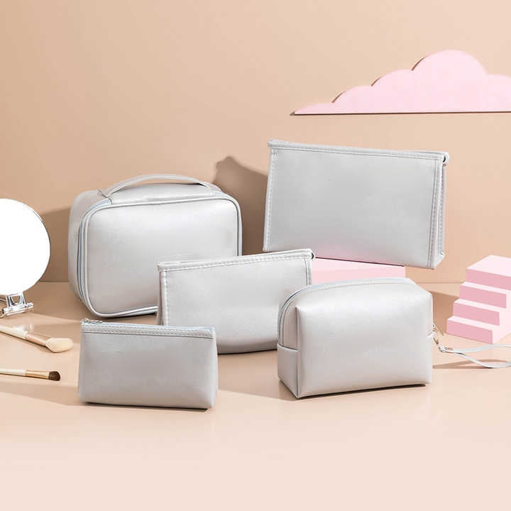 5 Piece leather travel cosmetic bags set for organizing makeup and toiletries during travel and daily use