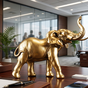 Golden elephant figurine with raised trunk for home and office decorative display