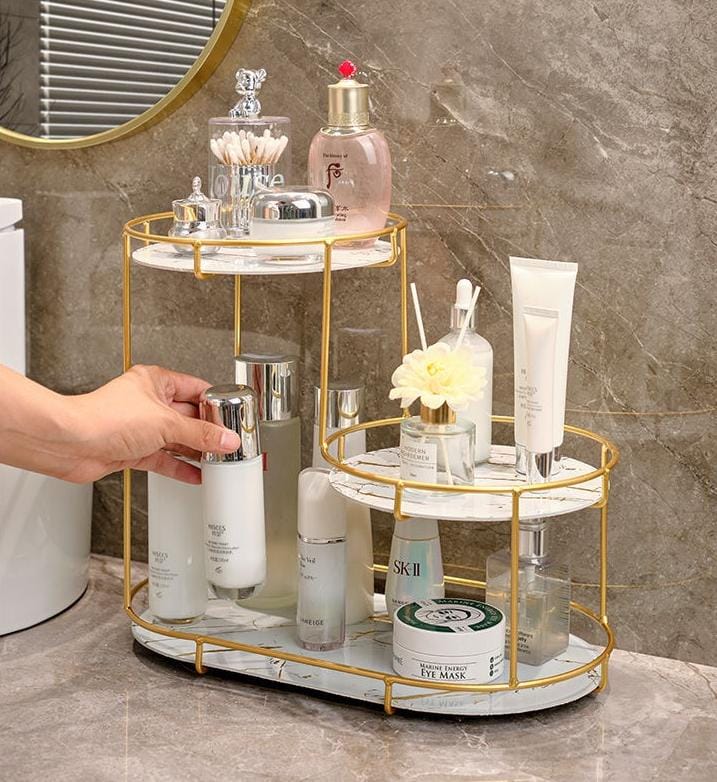 White 3-layer cosmetic storage rack for organizing makeup and beauty essentials.