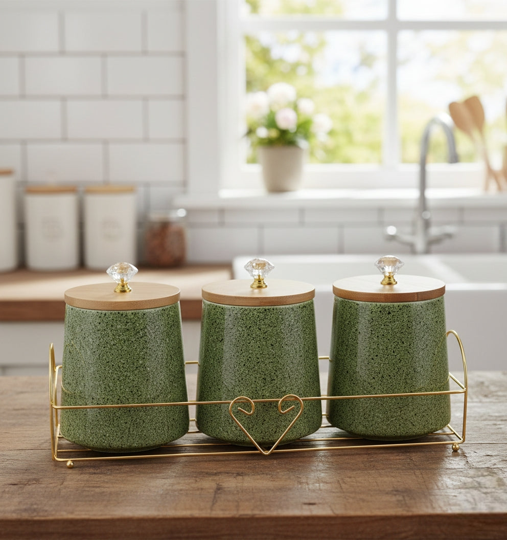 Three-piece ceramic seasoning jars with airtight bamboo lids on a kitchen counter