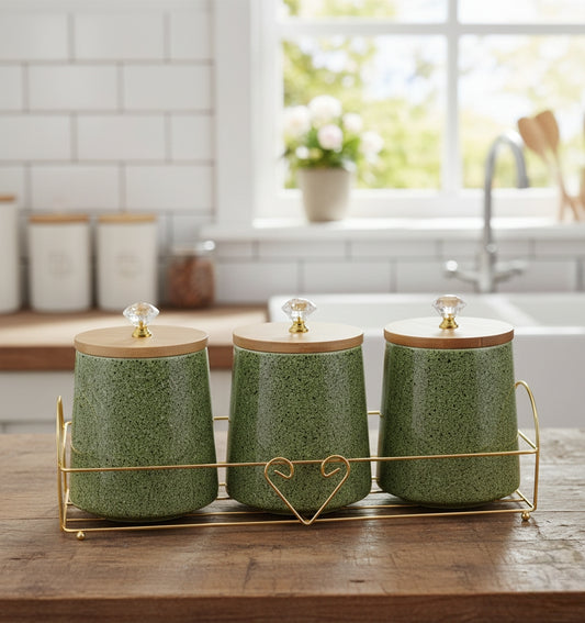 Three-piece ceramic seasoning jars with airtight bamboo lids on a kitchen counter
