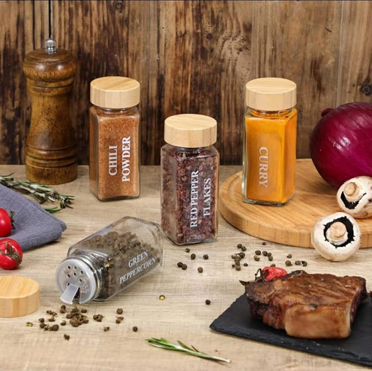 29-piece Glass spice jar set with bamboo lids, adjustable holes, funnel, stickers, pen, and cleaning brush.