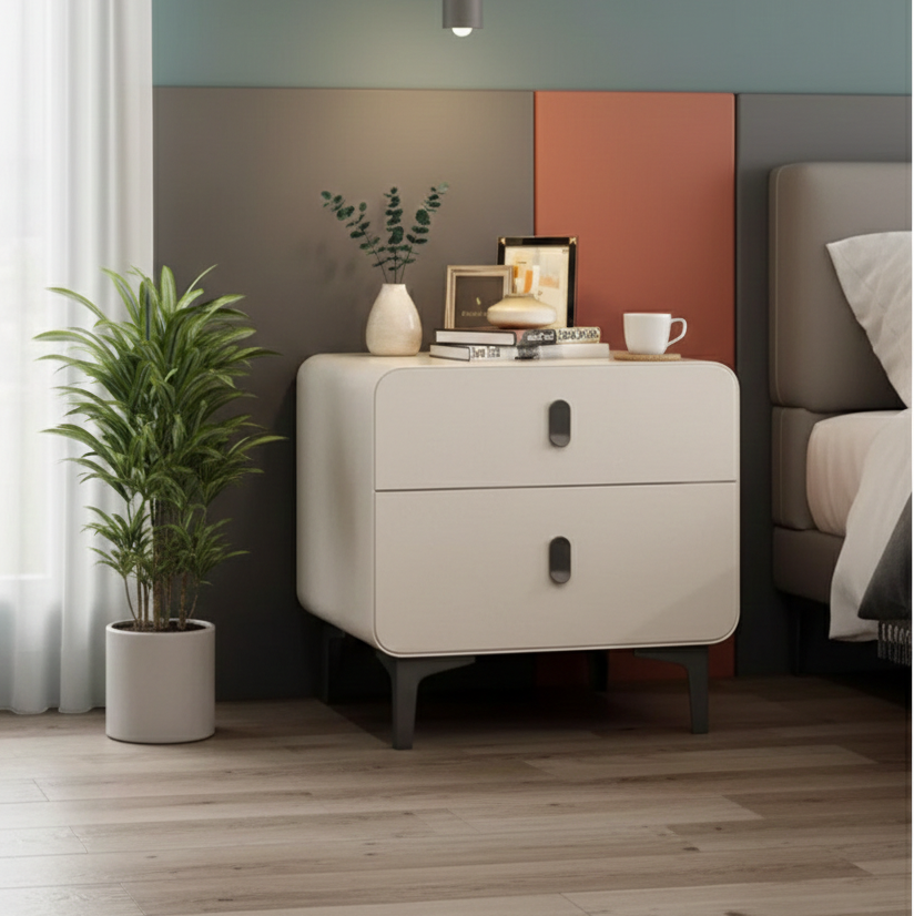 White bedside table with a modern, compact design.