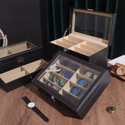 Black PU leather sunglasses organizer box with eight storage slots for eyewear and accessories.